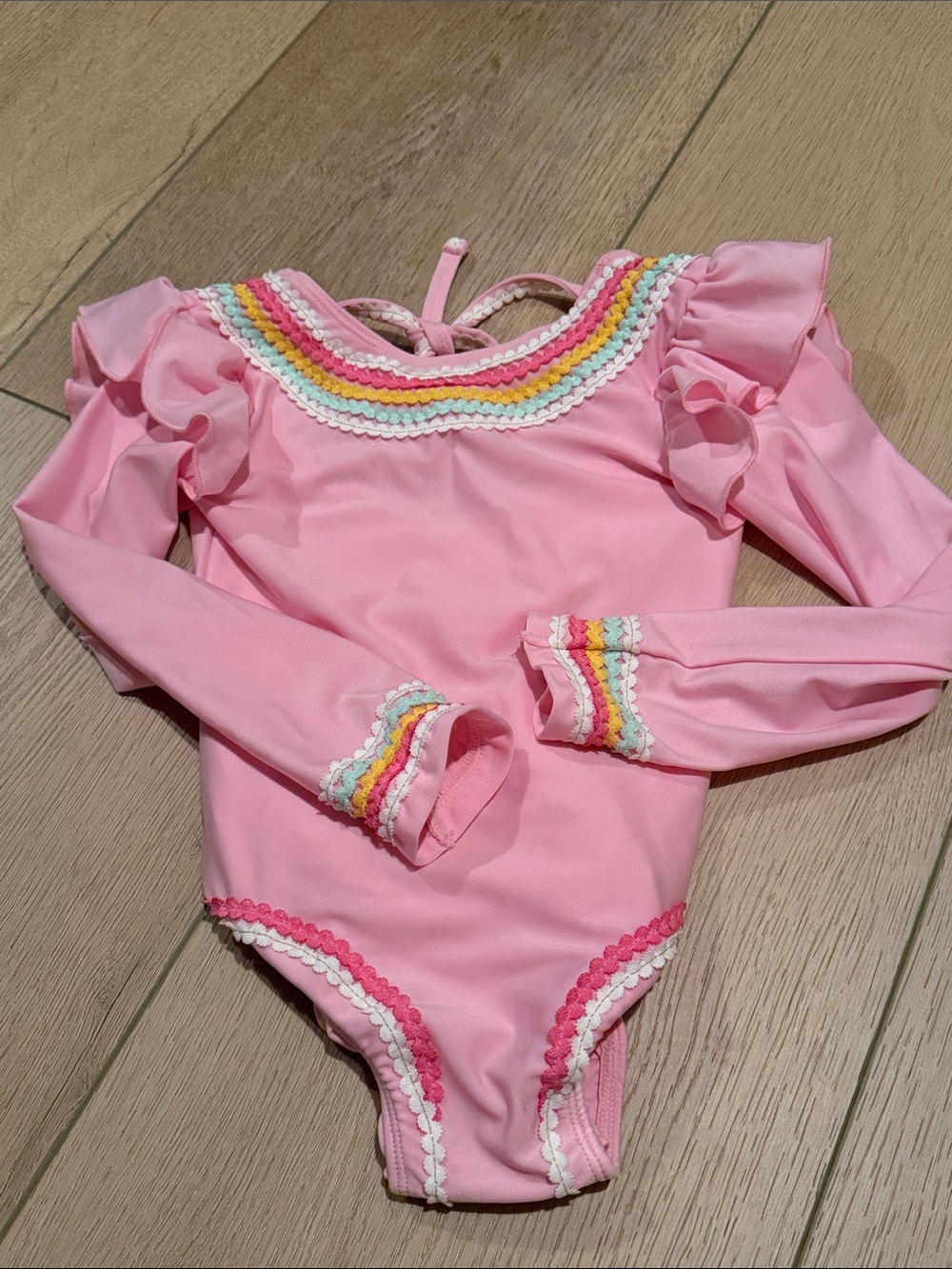 Kids Pink Ruffle One-Piece Swimsuit with Rainbow Trim. No flaws.